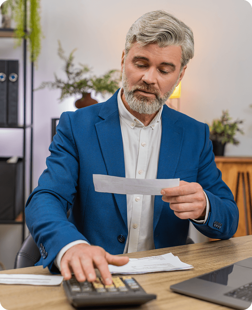 Bookkeeping professional reviewing payroll documents